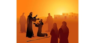 Jesus healing a kneeling man at sunset with onlookers around.