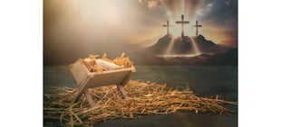 Manger with cross in background, symbolizing Jesus' birth and sacrifice
